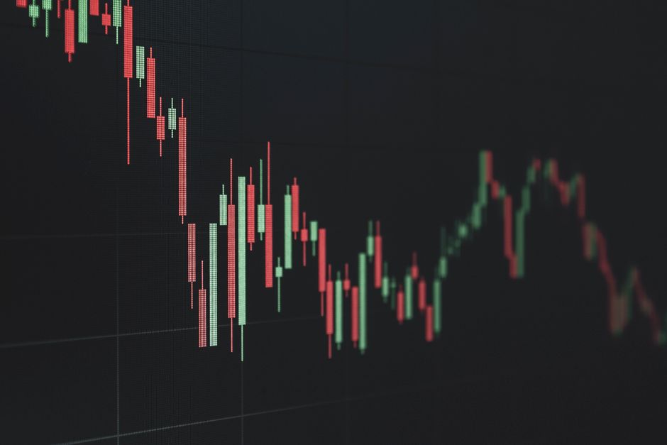 Stock market data chart showing trends in red and green. Perfect for financial and business themes.